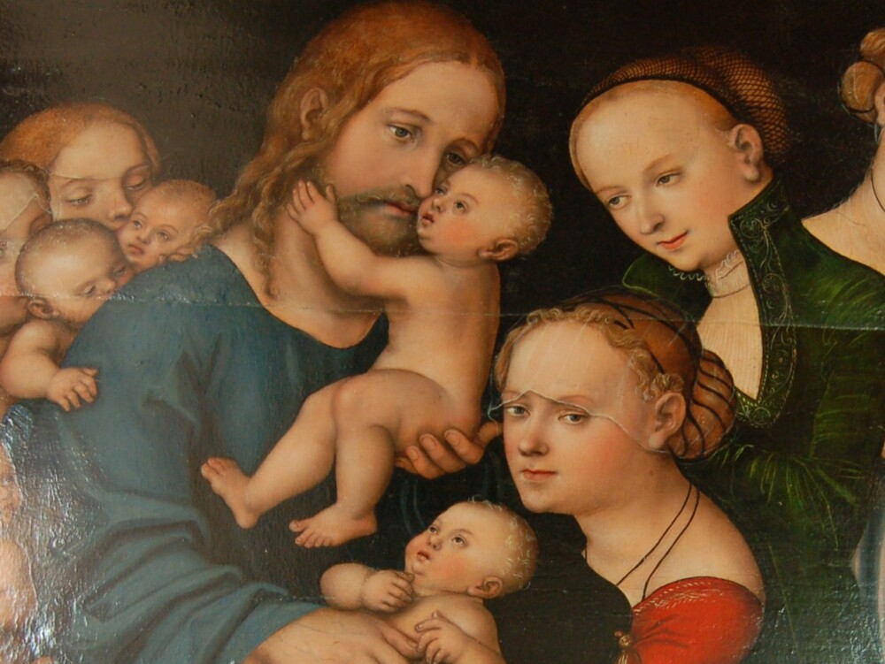 Maleri af Lucas Cranach ca 1525 forestiller Jesus, der holder små børn og to mødre, som bærer deres børn til ham